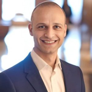 Dr Adrian J Tomyn